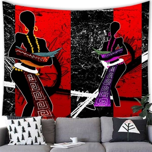 Detail of African woman abstract tapestry with vivid colors hanging above a modern sofa