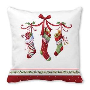 Close-up of Christmas cushion with festive stockings and gift illustrations