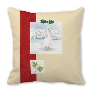 Detail of Christmas peach skin cushion with winter goose and holly foliage prints