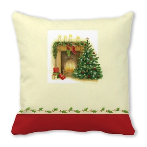 Detail of Christmas throw pillow with vintage fireplace and tree illustration on soft fabric