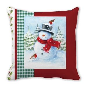Detail of Christmas peach skin cushion cover featuring snowman and festive red patterns