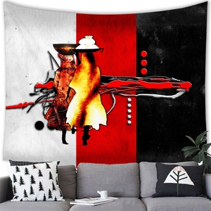 Abstract African women wall tapestry hanging above a modern grey sofa in a living room