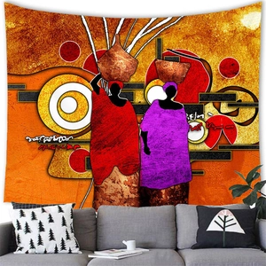 African tribal woman abstract wall tapestry hanging above a modern living room sofa
