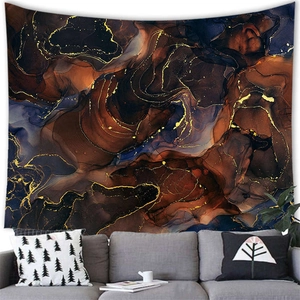 Modern abstract wall tapestry with blue and gold marble texture over a gray sofa
