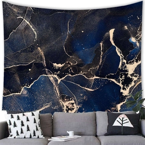 Detailed texture of blue marble tapestry with gold veins hanging above a modern sofa