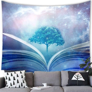Detailed view of galaxy book tapestry with glowing blue tree hanging above a sofa