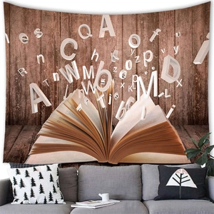 Detail of magic book tapestry with letters over a grey fabric sofa in a cozy living room