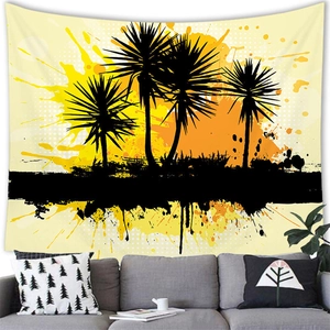 Detail of sunset beach wall tapestry with black palm silhouettes above a modern sofa