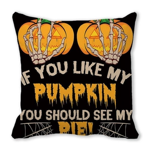 Detail of Halloween pillow case with pumpkin and skeleton hand print on peach skin fabric