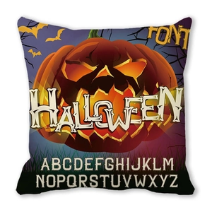 Macro shot of Halloween pumpkin pillow fabric showing clear texture and festive details