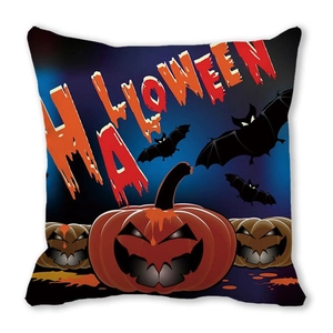 Detail of Halloween pillowcase with orange bloody text, black bats, and pumpkins