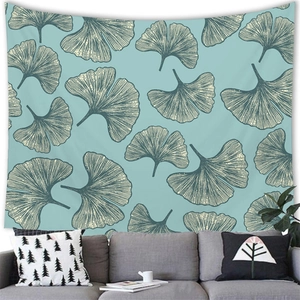 Détail de la tapisserie à feuilles tropicales montrant la texture fine du tissu brossé