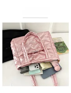 Top view of pink quilted tote bag showing large capacity for phone, tablet, and umbrella