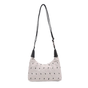 Sac sous le bras blanc en demi-lune avec motifs nœuds noirs et doubles bandoulières