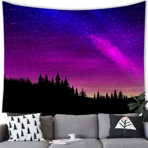 Detailed macro view of the starry night sky tapestry hung above a modern gray sofa