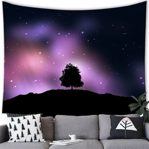 Cozy living room decor featuring a colorful starry sky and forest silhouette tapestry