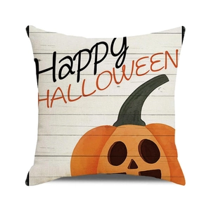 Detail van Halloween kussenhoes met pompoen en een rustieke houtnerf textuur