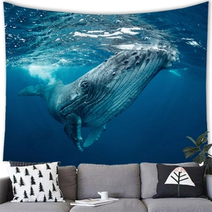 Detail of whale breach tapestry hanging over a sofa for modern living room decor
