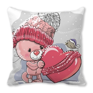 Detail of Christmas throw pillow featuring a cute cartoon cat with a heart and snowflake motifs