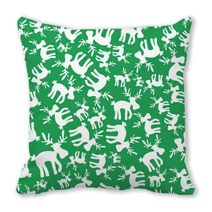 Green Christmas square pillow cover with white reindeer pattern on peach skin fabric