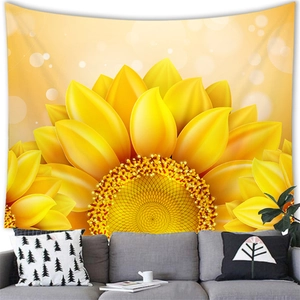 Detail showing the vibrant watercolor sunflower texture on a soft hanging tapestry