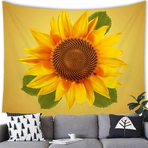 Detailed texture of vibrant yellow sunflower tapestry hanging above a modern sofa