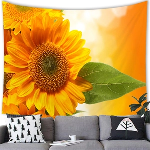 Detail of vibrant watercolor sunflower tapestry with soft brushed fabric texture on wall