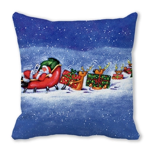 Macro view of Christmas pillowcase showing Santa Claus on a reindeer sleigh in snow