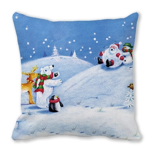 Detail of Christmas throw pillow with Santa and Reindeer print on blue background