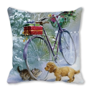 Détail de la housse de coussin avec une illustration de Noël d'un chat et d'un chien