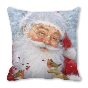 Close-up of Santa Claus oil painting print on peach skin cushion cover with robin birds