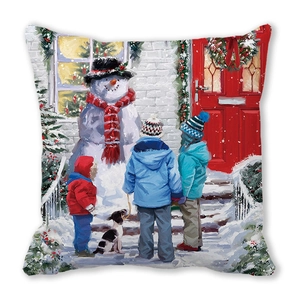 Macro detail of Christmas peach skin cushion showing winter scene artwork of kids and snowman