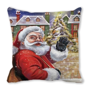 Detail of Christmas pillowcase featuring a smiling Santa Claus and snowy tree scene