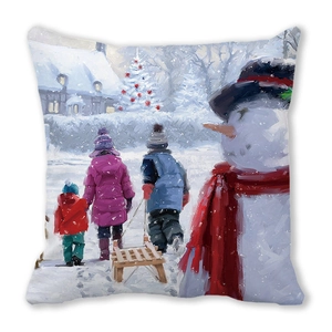Detail of Christmas throw pillow featuring an oil painting style winter snow scene