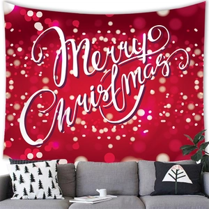 Detail showing a red Christmas tapestry with Merry Christmas text above a sofa