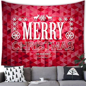 Red Christmas tapestry with snowman and reindeer hanging above a grey sofa