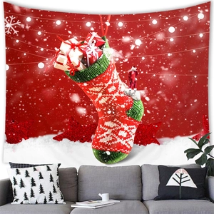 Festive Christmas snowman wall tapestry hanging above a grey sofa for home decor