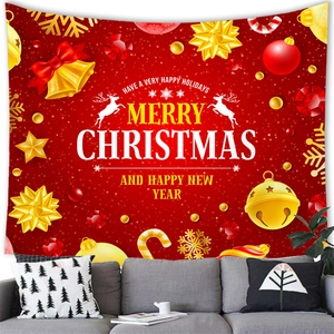 Merry Christmas tapestry with gold bells and red ribbon hanging above a modern grey sofa