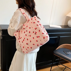 Pink corduroy tote bag with strawberry print and wide strap for women and students