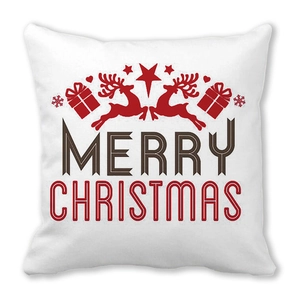 Détail du coussin en peau de pêche avec renne rouge festif et imprimé Merry Christmas