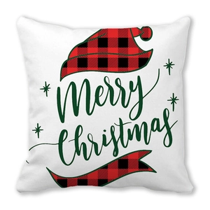 Détail de la taie d'oreiller Joyeux Noël avec lettrage vert et bonnet écossais rouge