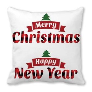 Détail d'une taie d'oreiller blanche avec texte Merry Christmas en motif à carreaux buffalo