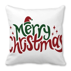 Détail de la texture du tissu du coussin de Noël avec police de caractère artistique