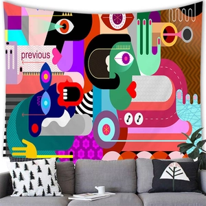 Close-up of colorful abstract art tapestry with face silhouettes and geometric patterns