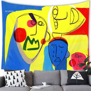 Abstract line art face tapestry with colorful geometric patterns in a modern living room
