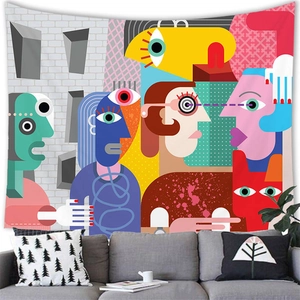 Detail of colorful abstract cubist face tapestry on a modern living room wall