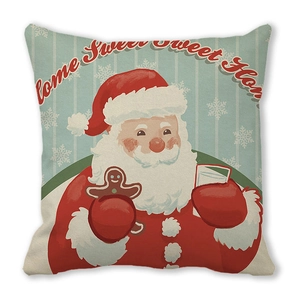 Detail of Christmas pillow cover with vintage Santa Claus and Home Sweet Home text