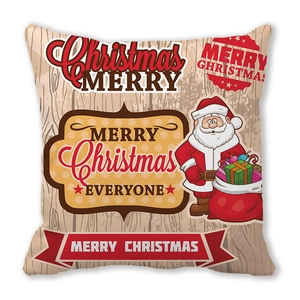 Detail of Christmas pillow cover with Santa Claus print on peach skin wood grain fabric