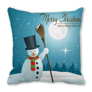 Detail of square pillowcase featuring a cartoon snowman and Merry Christmas greeting