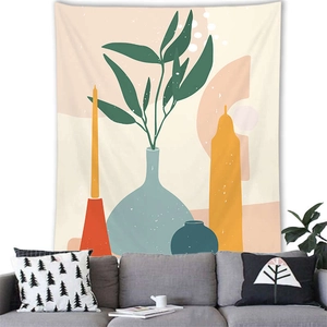 Detailed close-up of Morandi botanical wall tapestry over a modern minimalist sofa